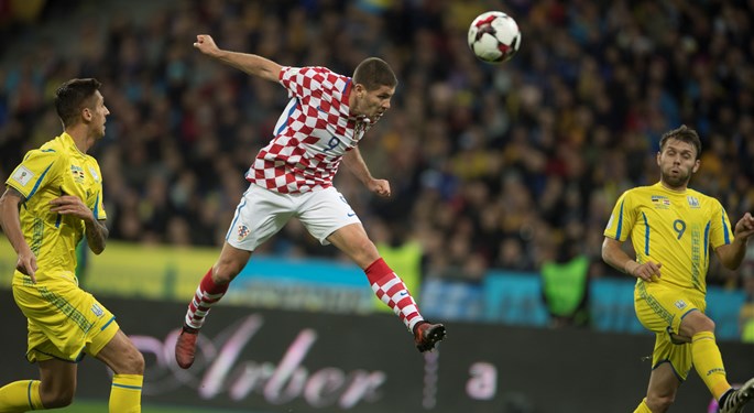 Kramarić brace secures Croatia play-off spot
